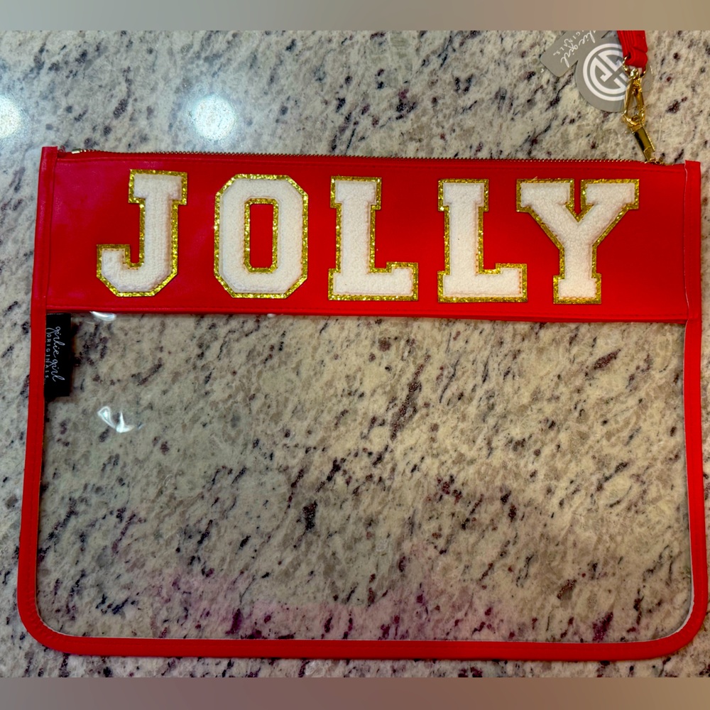 Red 'Jolly' Clear Clutch NEW zip closure. Still has tags. I have multiple.